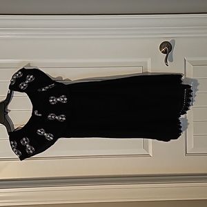 618 Ladies small black dress with white embroidery